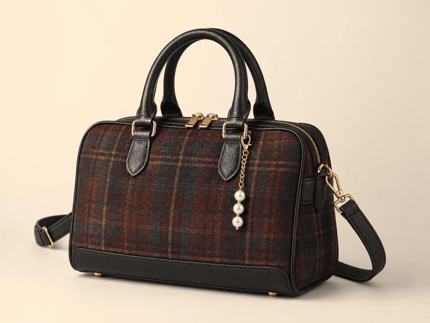 Burgundy tartan bowler handbag with twin handles and detachable strap