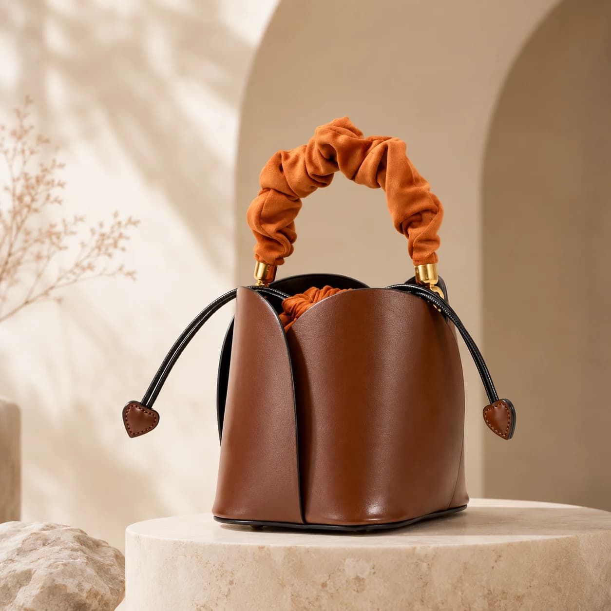 Novlane genuine leather drawstring bucket handbag in a sculptural silhouette